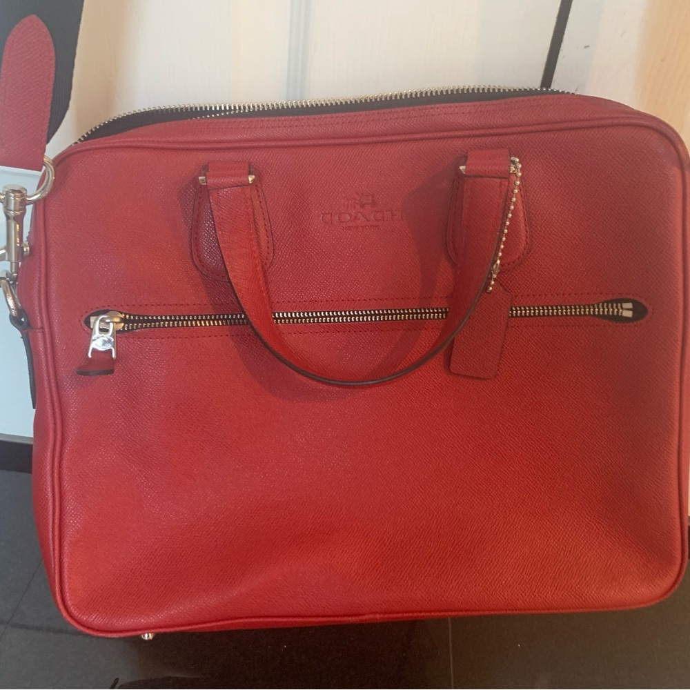 Coach genuine leather red laptop bag. Brand new, never been used without tags.